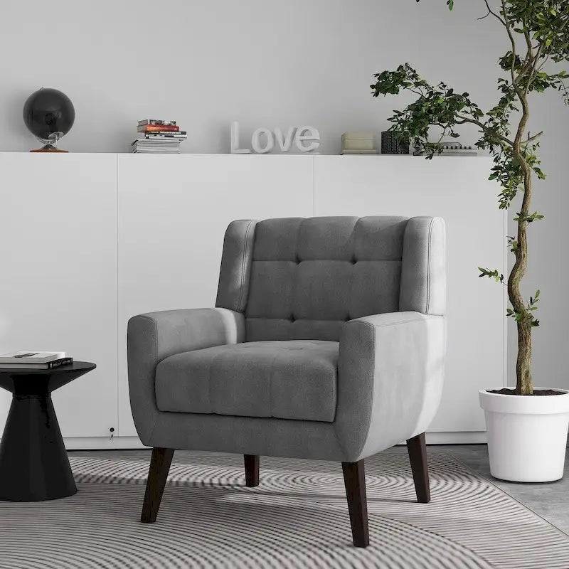 Gestoffeerde loungefauteuil met gecapitonneerde armleuningen