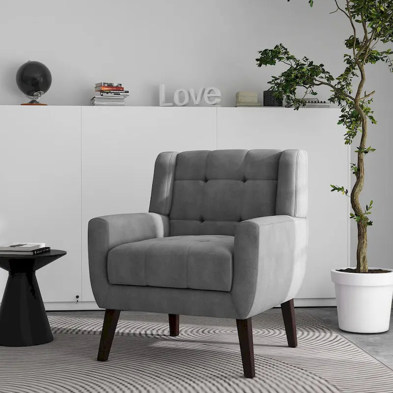 Gestoffeerde loungefauteuil met gecapitonneerde armleuningen