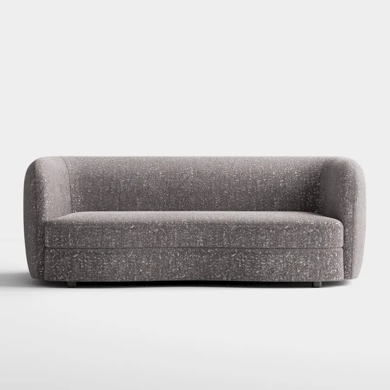 Canapé en bouclé moderne à accoudoirs courbés, assise en forme de rein et pieds ronds en bois