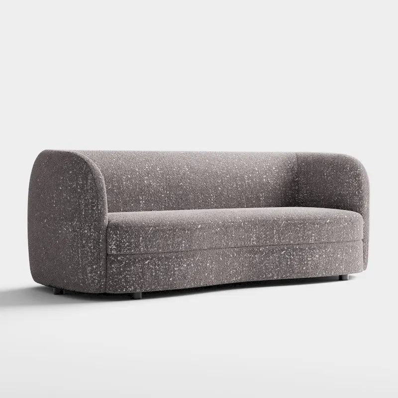 Canapé en bouclé moderne à accoudoirs courbés, assise en forme de rein et pieds ronds en bois
